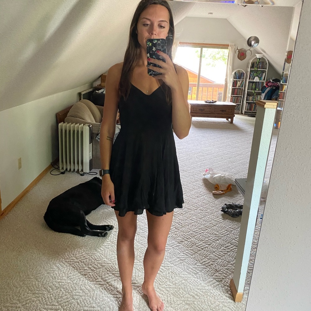 Cross strap black mini dress